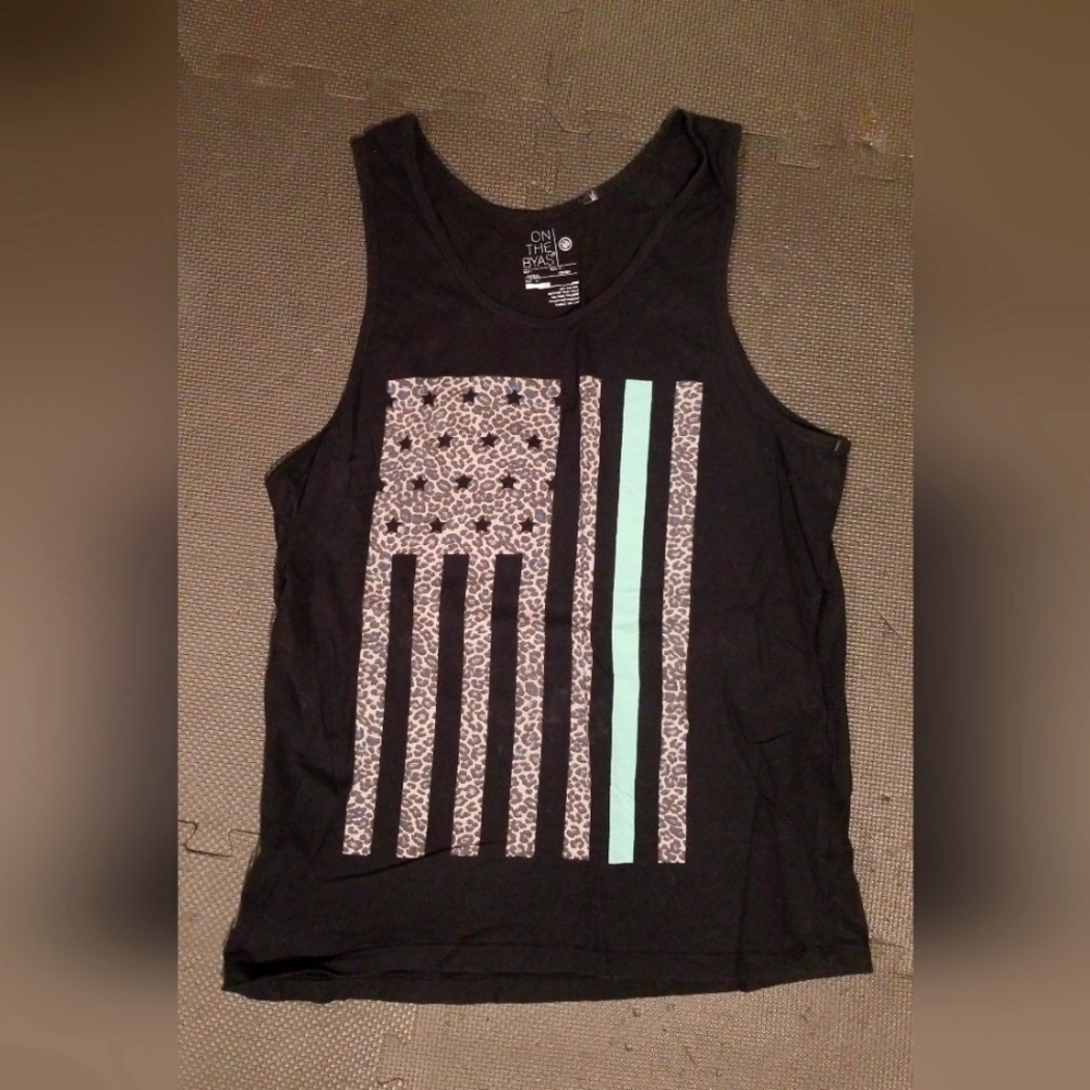 On the Byas flag/ cheetah print tank